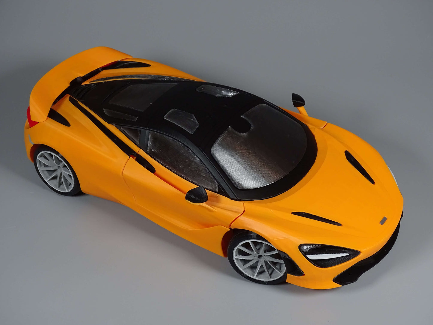 RC McLaren 720S Karosserie DRS Edition in leuchtendem Orange, detailreiche Nachbildung mit sportlichem Design.