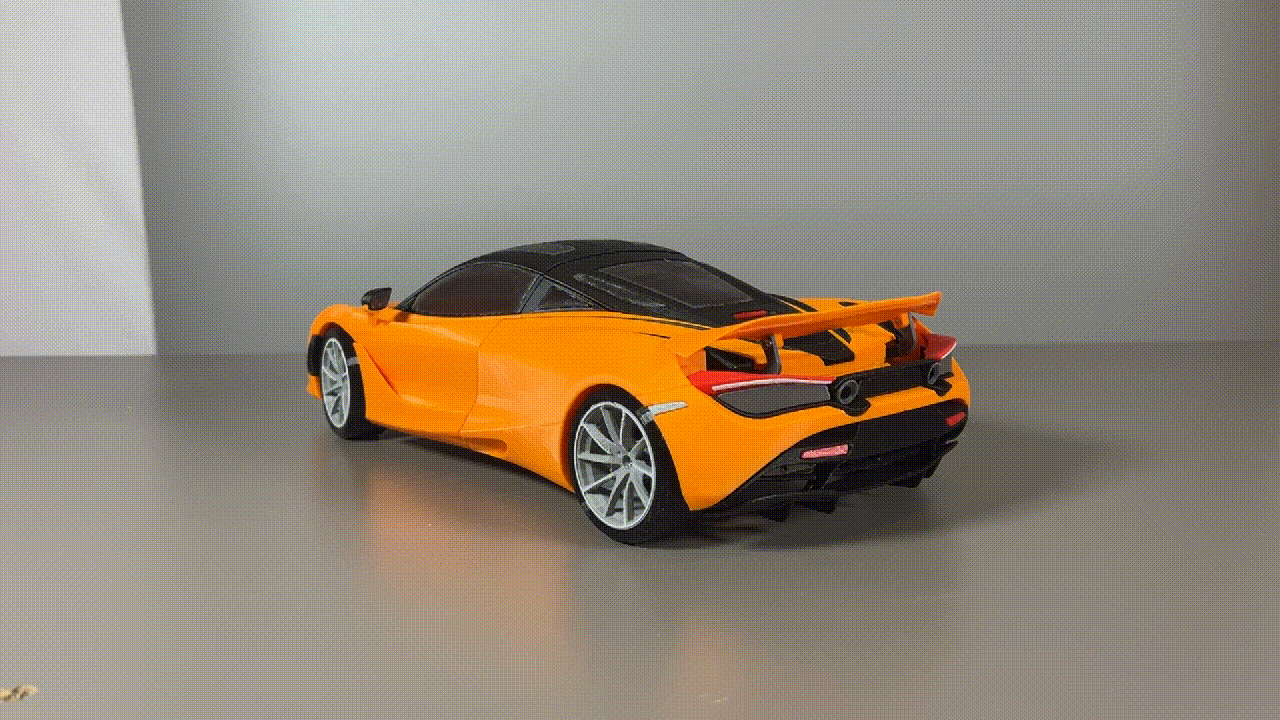 RC McLaren 720S Karosserie DRS Edition in leuchtendem Orange, zeigt aerodynamisches Design und auffällige Details.